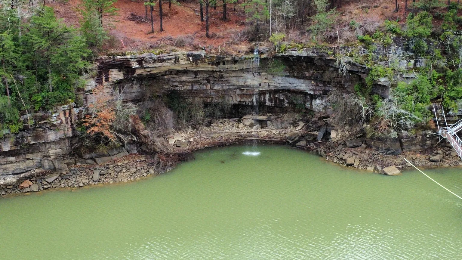 Rock bluff and waterfall alcove along the Highland Shores waterfront