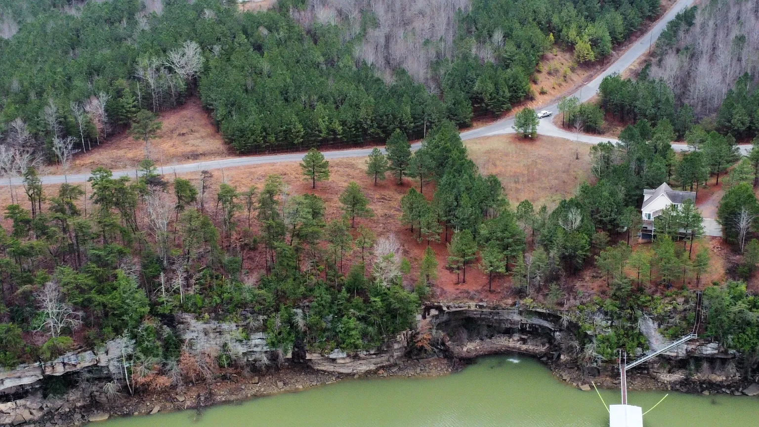Aerial view of The Highland Shores shoreline and homes above the bluff